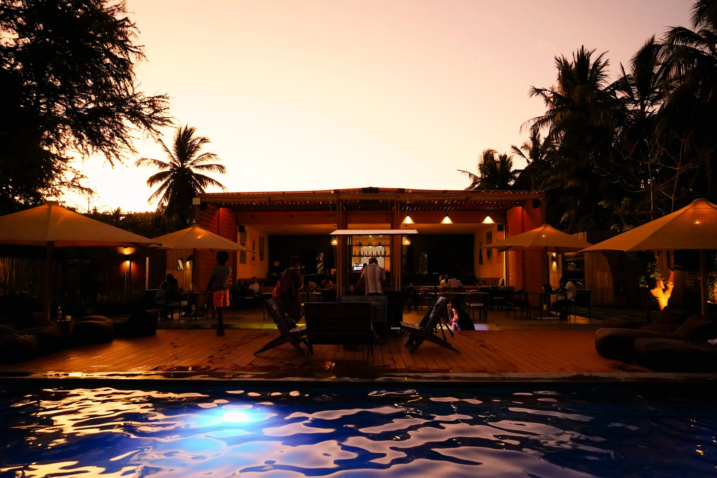 The pool lit blue after sunset