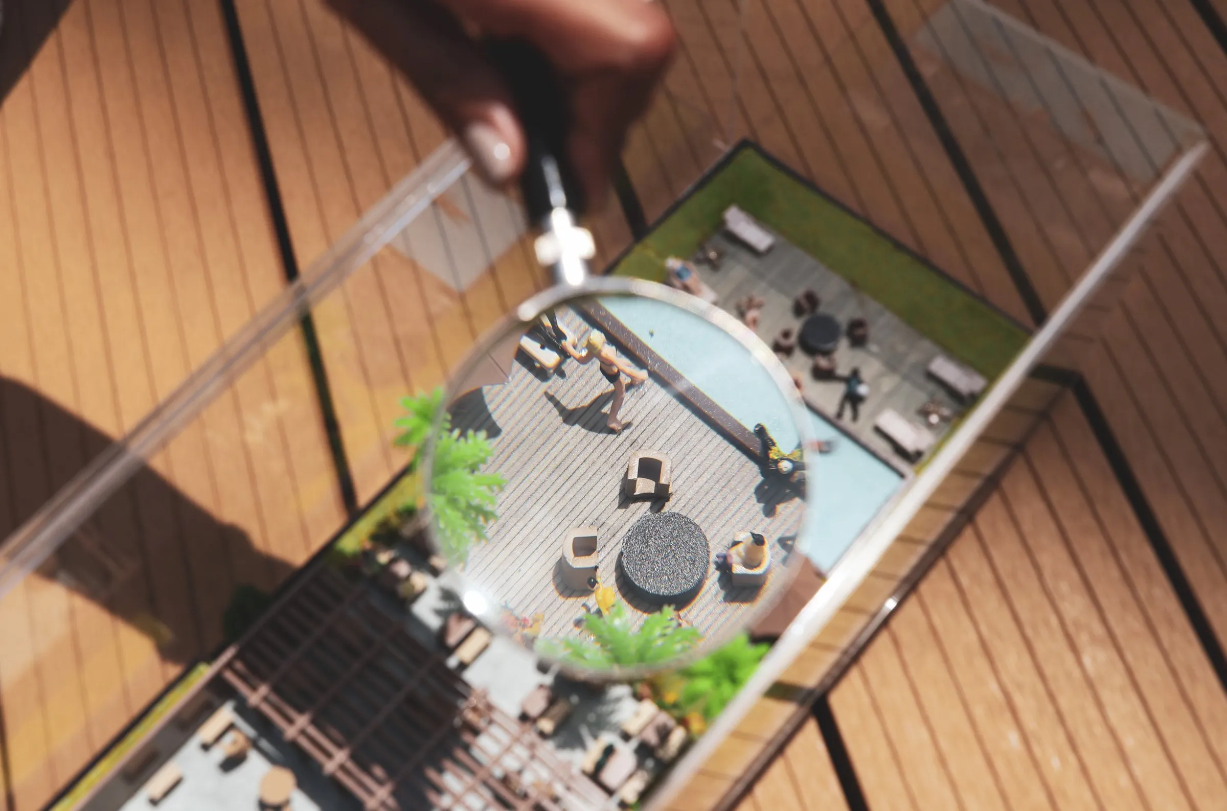 A miniature sculpture under a magnifying glass at Sunnyside Up