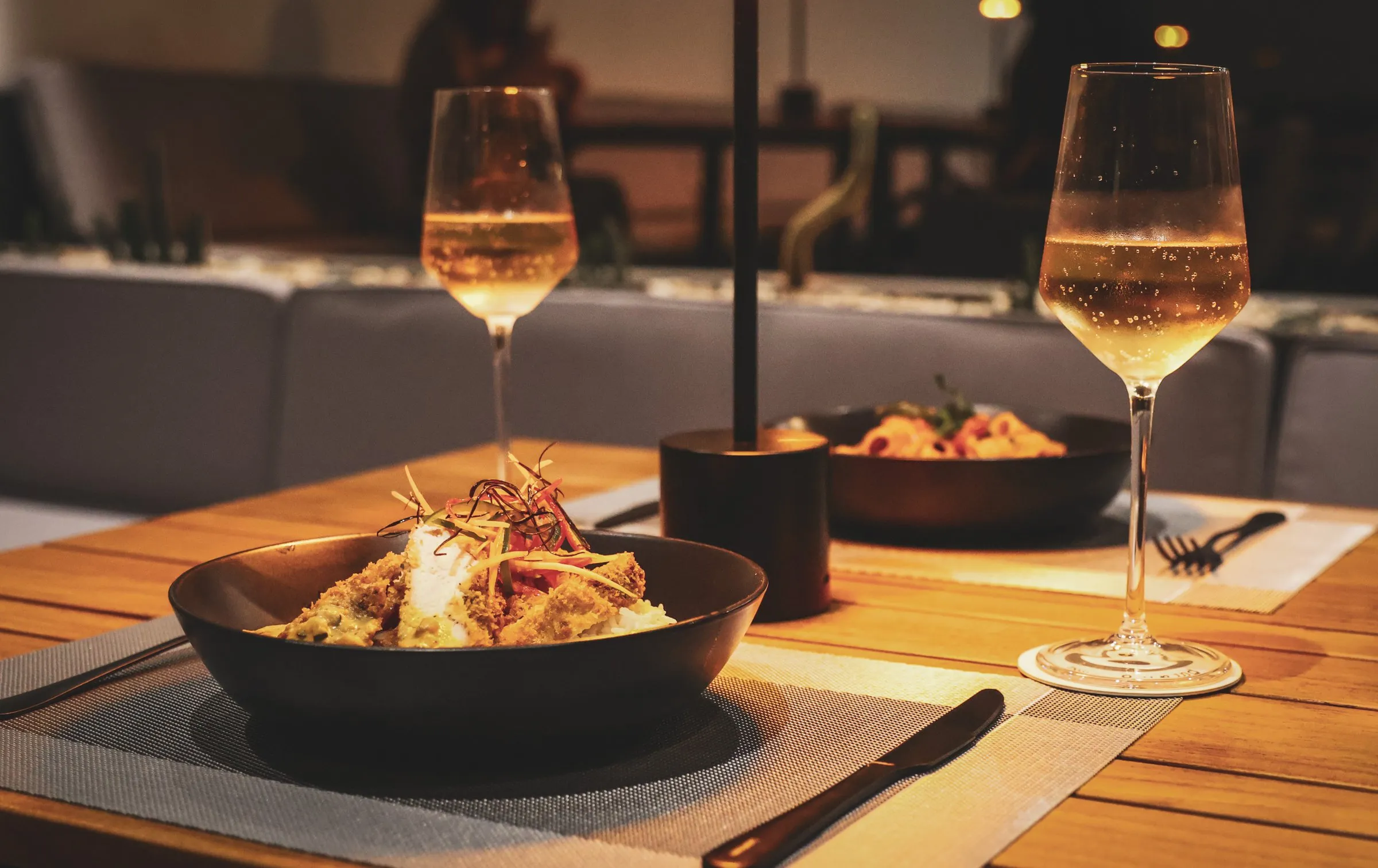 Dinner for two, wine poured